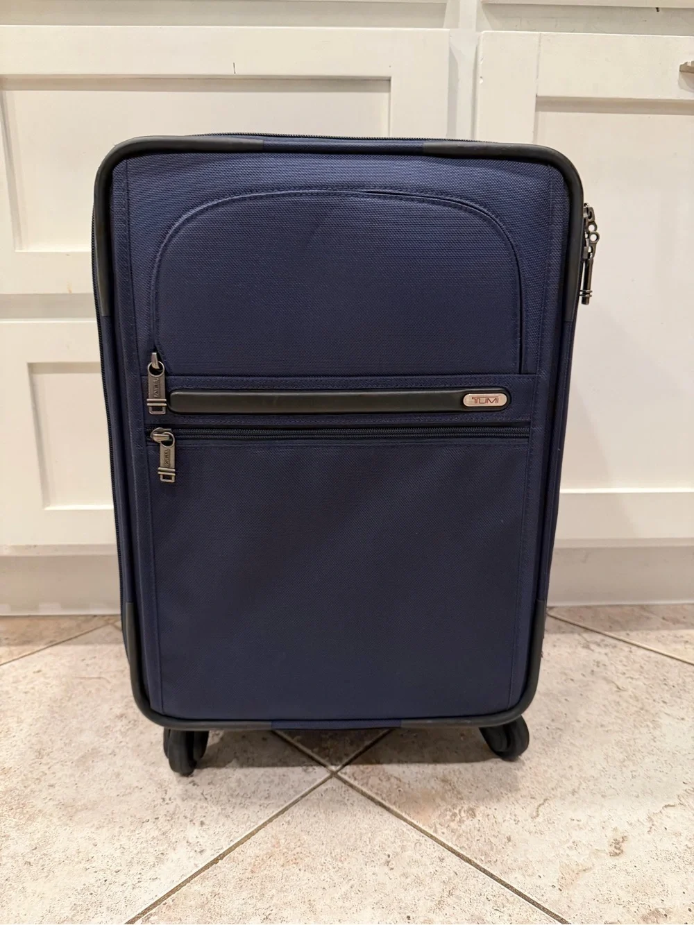 Tumi Navy Softside Carry-On Spinner